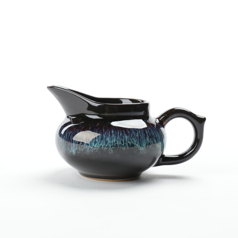 Ya xin company hall temmoku glaze ceramic fair coppering. As silver cup large up with tea and a cup of tea tea machine tools