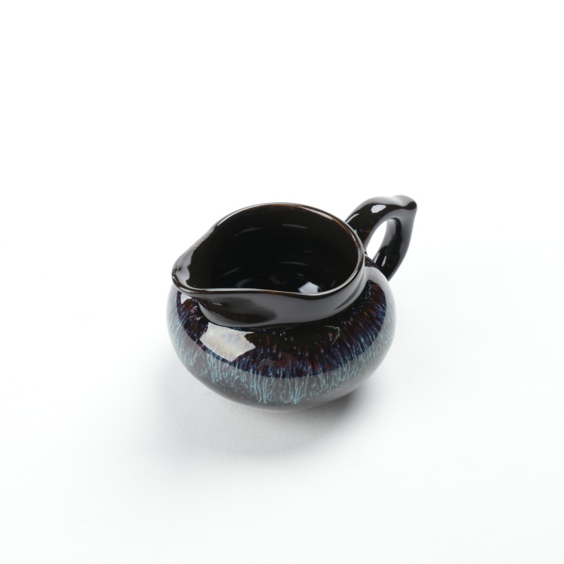 Ya xin company hall temmoku glaze ceramic fair coppering. As silver cup large up with tea and a cup of tea tea machine tools