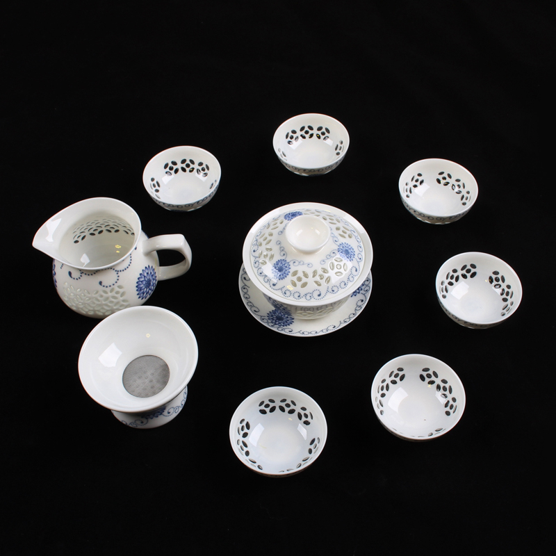 Ya xin honeycomb and exquisite tea sets suit hollow out gift box of blue and white porcelain ceramic cups high - grade contracted household kung fu