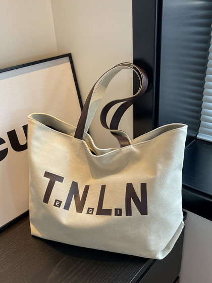 High-End Large-Capacity Canvas Bag for Women 2026 New Shoulder Bag Casual Versatile Tote Bag Work Commute Bag