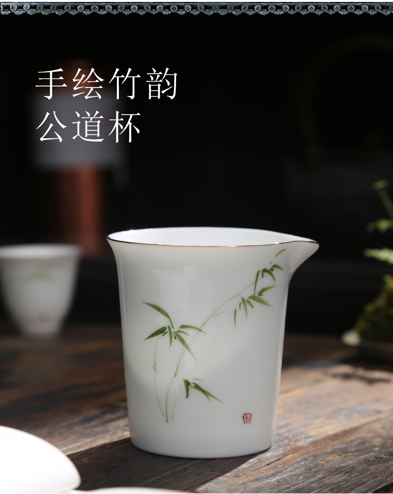 Hand - made ceramic fair keller) suit household dehua white porcelain points of tea and a cup of tea filter blue and white porcelain tea sea