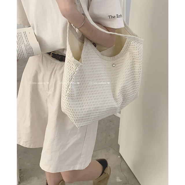 ຖົງຜ້າຂອງແມ່ຍິງ 2024 ໃຫມ່ summer armpit tote bag versatility ນັກສຶກສາຫ້ອງຮຽນຄວາມອາດສາມາດຂະຫນາດໃຫຍ່ຖົງຜ້າ