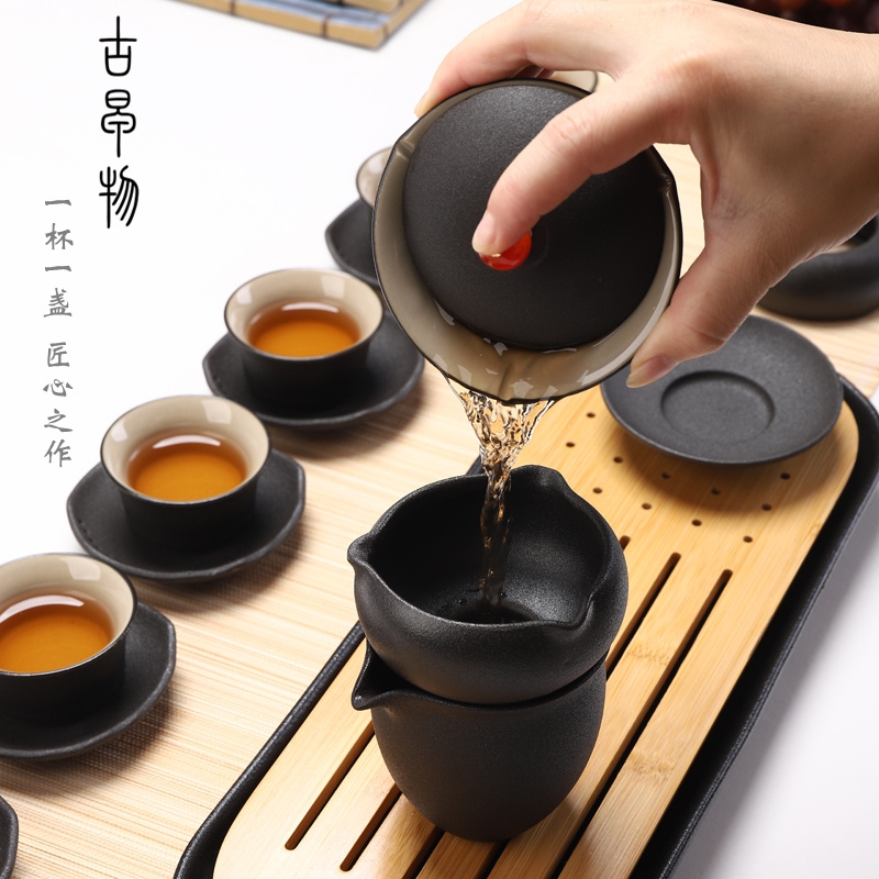 Kung fu tea set of black suit household contracted office of a complete set of ceramic tureen coarse pottery teapot Japanese tea tray