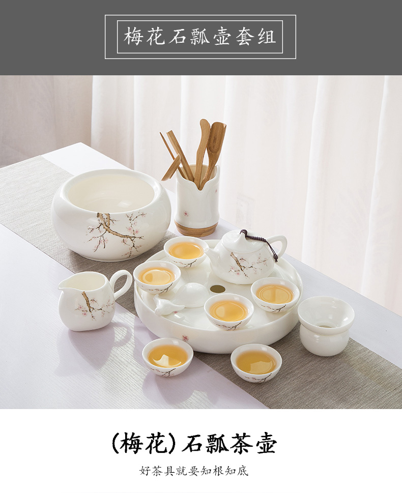 A complete set of dehua white porcelain suet jade suit household green kung fu tea set ceramic tea tray was contracted tea table