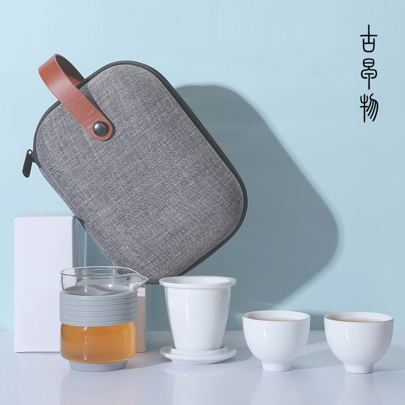 Crack cup against a pot of hot ceramics 2 cup glass is suing portable travel kung fu tea set contracted with you