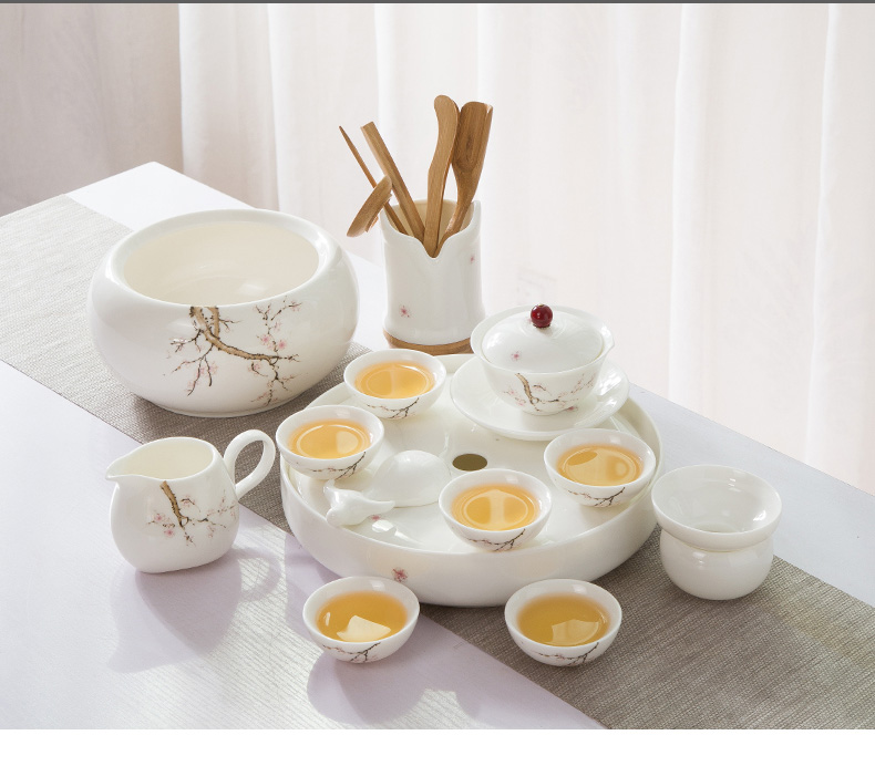 A complete set of dehua white porcelain suet jade suit household green kung fu tea set ceramic tea tray was contracted tea table