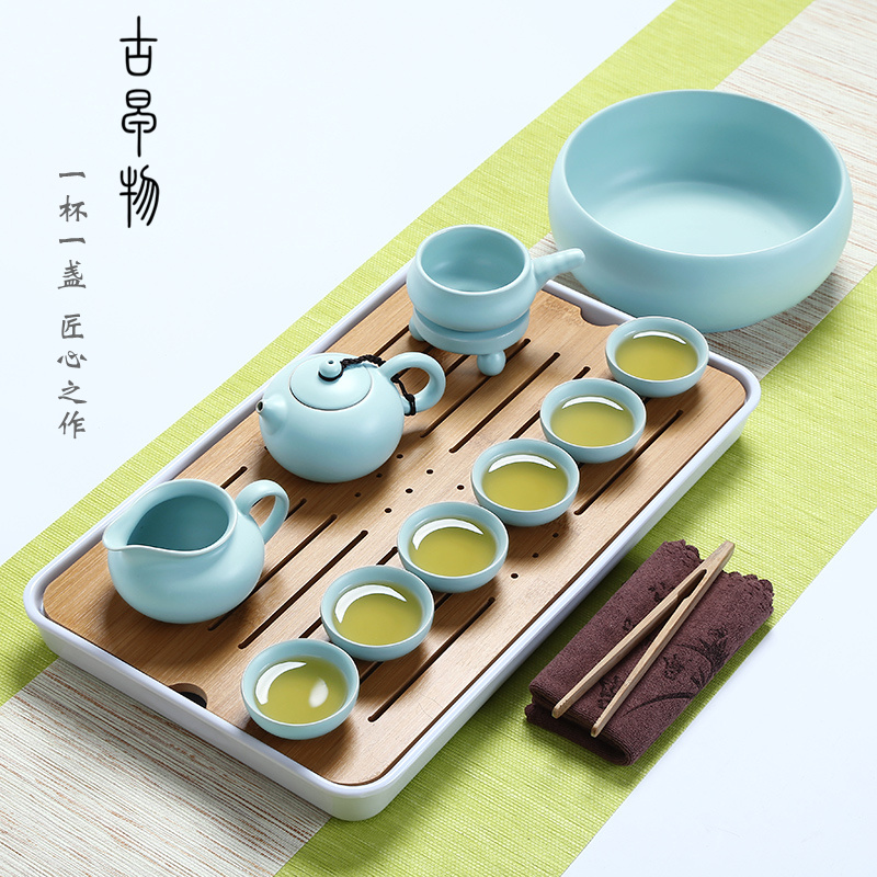 Your up with porcelain of a complete set of kung fu tea set suit household porcelain travel portable cup lid bowl of Japanese tea tray