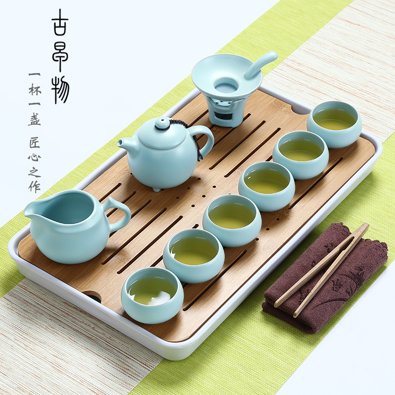 Your up with porcelain of a complete set of kung fu tea set suit household porcelain travel portable cup lid bowl of Japanese tea tray