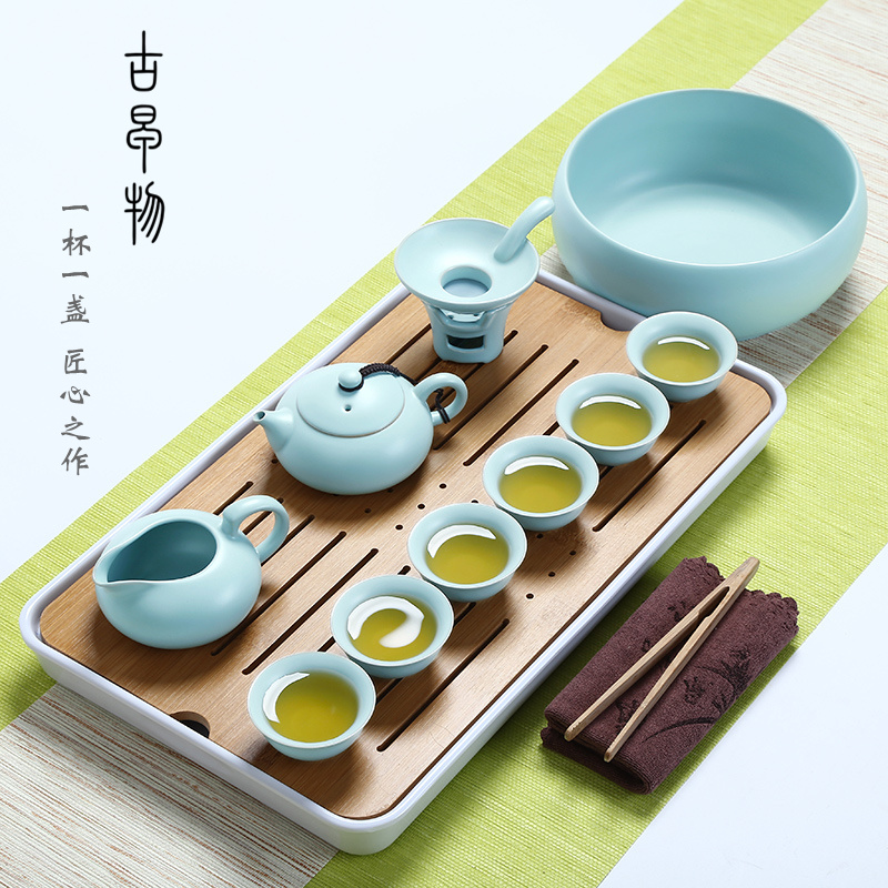 Your up with porcelain of a complete set of kung fu tea set suit household porcelain travel portable cup lid bowl of Japanese tea tray