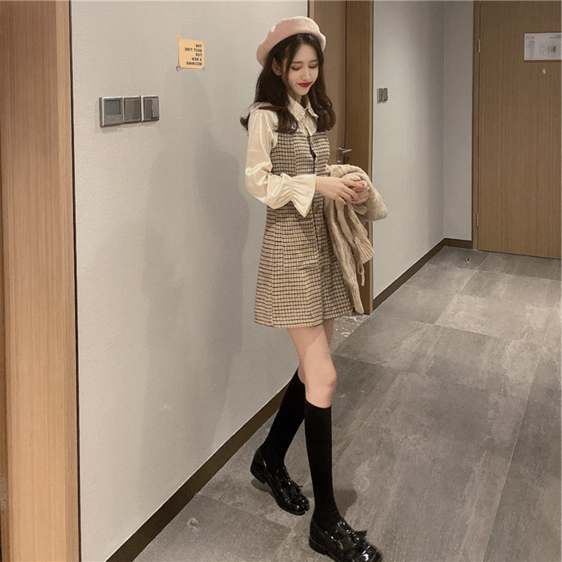 Withdraw the autumn and winter fake two shirts splicing grid with trumpet sleeve dress new Han Edition temperament