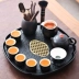 Bàn trà bằng đá tự nhiên gốm loại lưu trữ nước nhỏ Đá Wujin hiện đại nhỏ gọn văn phòng tại nhà khay trà kung fu bộ trà nĩa gỗ Tấm