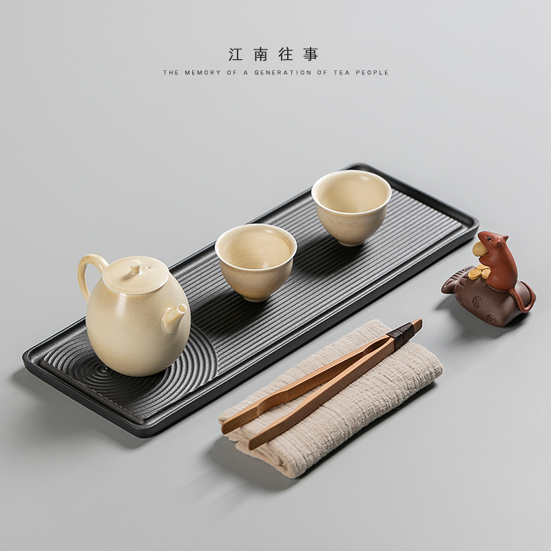 Jiangnan tea past small black pottery dry ground plate household dry landscape kunfu tea tray bearing small pot of tea