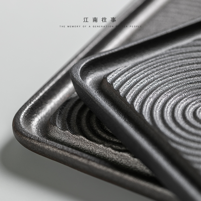 Jiangnan tea past small black pottery dry ground plate household dry landscape kunfu tea tray bearing small pot of tea