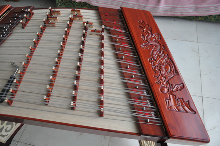 Nhà máy trực tiếp quốc gia gảy dụng cụ gỗ gụ dulcimer gỗ hồng đỏ chạm khắc rồng 402 dulcimer nhập chơi Yangqin - Nhạc cụ dân tộc ống sáo