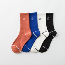 Mens midline socks casual socks cotton autumn and winter fashion simple Japanese solid color smile couple autumn and winter cotton socks
