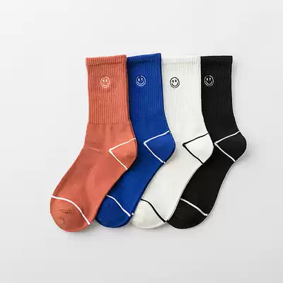 Men's mid-tube socks casual socks pure cotton autumn and winter fashion simple Japanese solid color smiley couple autumn and winter cotton socks