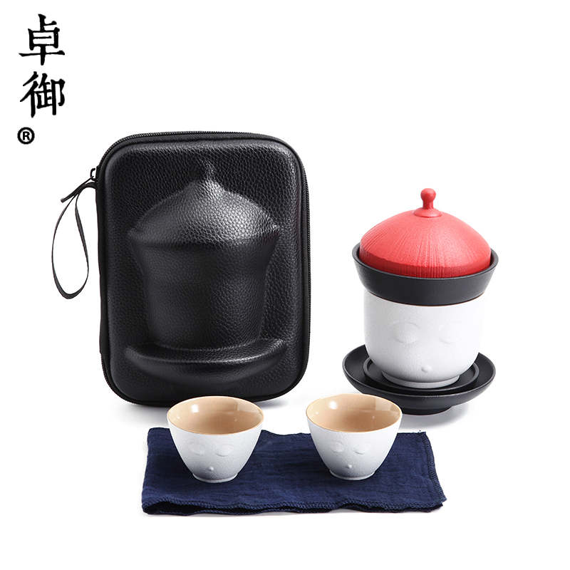 Zhuo imperial travel tea set to crack a cup of tea set a pot of four cups of tea set, ceramic work outdoors with the teapot