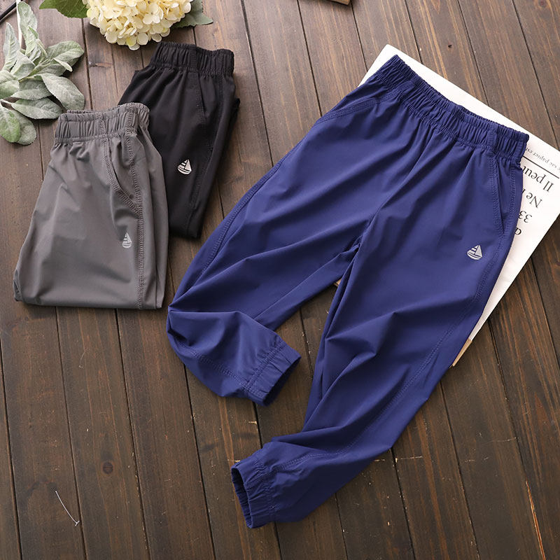 Boys' casual long pants 2020 spring new medium and large children's quick-drying beam pants students loose elastic thin sports pants