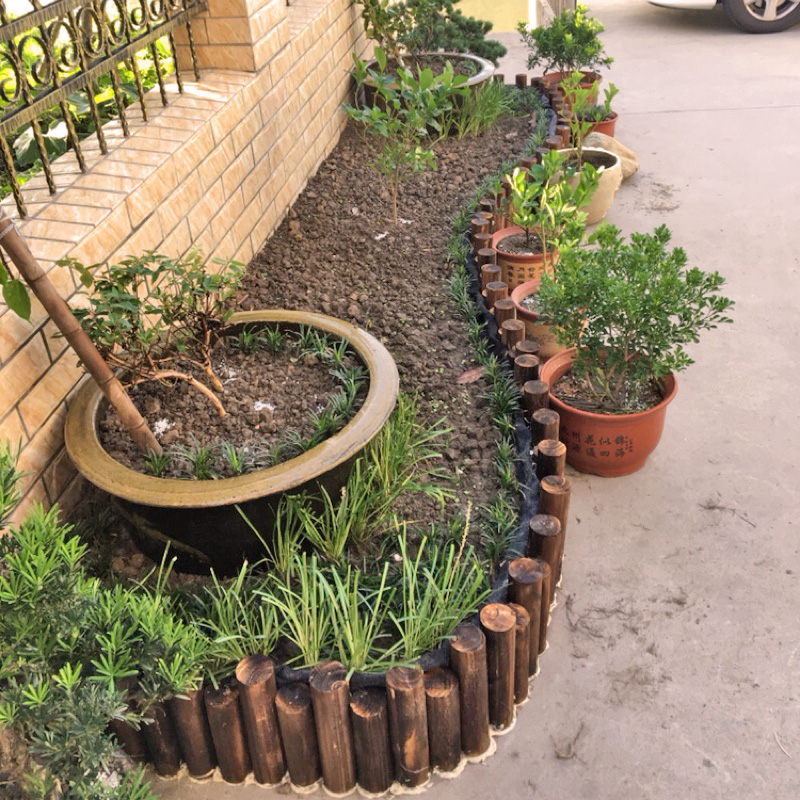 Courtyard outdoor anti-corrosion wood small fence indoor balcony outdoor garden flower pool decoration round wood stake fence fence