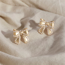 S925 silver needle matt gold butterfly knot earrings high level sensation profile earrings female Korean temperament retro ear decoration