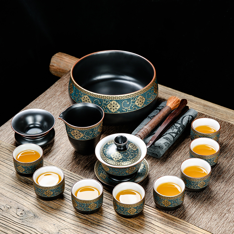 Bo yiu-chee gold kung fu tea set of household ceramic tea lid bowl of tea cups to wash the whole red glaze