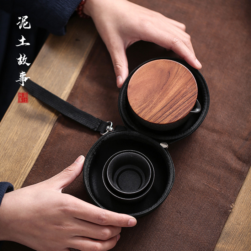 Earth story to crack a cup a pot of two cups of kung fu tea set suit, black pottery single travel portable cups