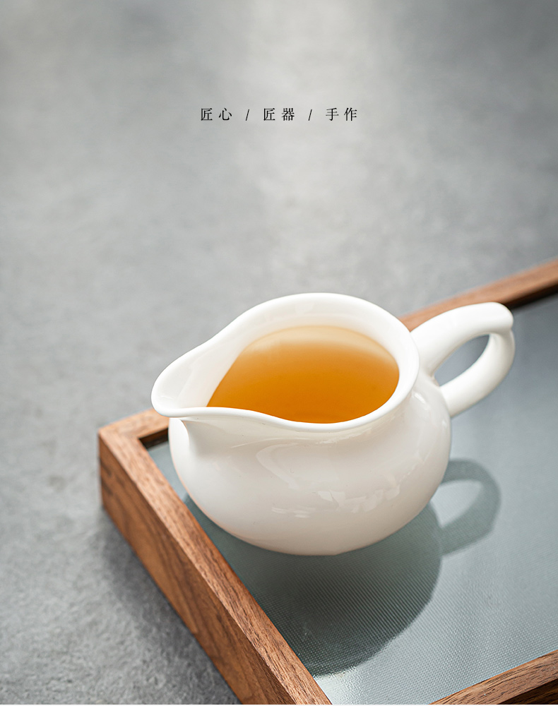 Ceramic appliance with fair keller make tea and a cup of tea is white jade porcelain filtering sea kung fu tea tea tea accessories