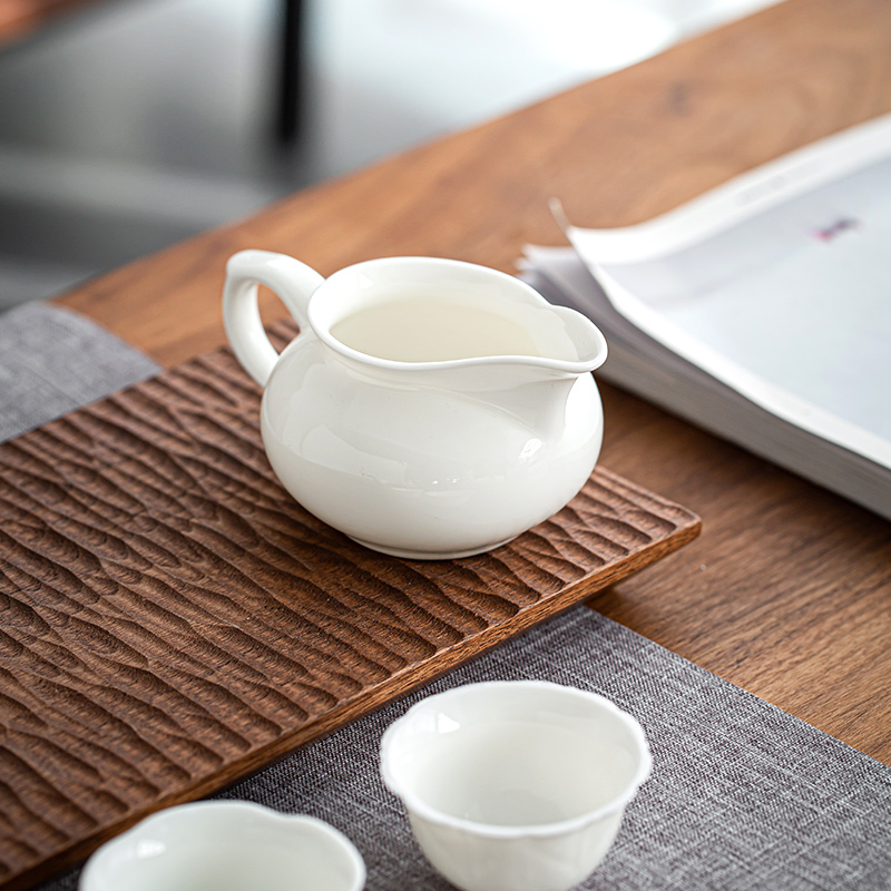 Ceramic appliance with fair keller make tea and a cup of tea is white jade porcelain filtering sea kung fu tea tea tea accessories