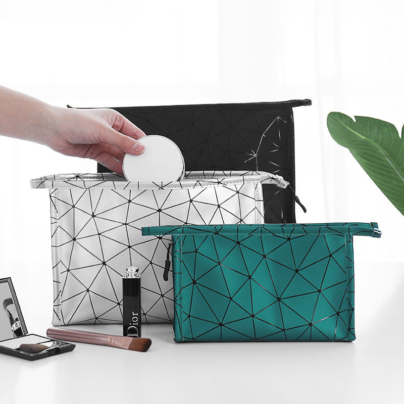 Makeup bag female portable capacity with small arm in wind superfiery travel handbag Korea simple washing lipstick