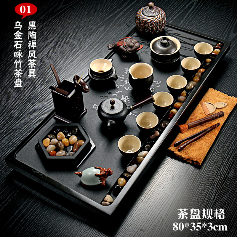 The whole piece of Wujinshi tea set household kung fu tea set set of simple stone tea table Tea Sea in-line