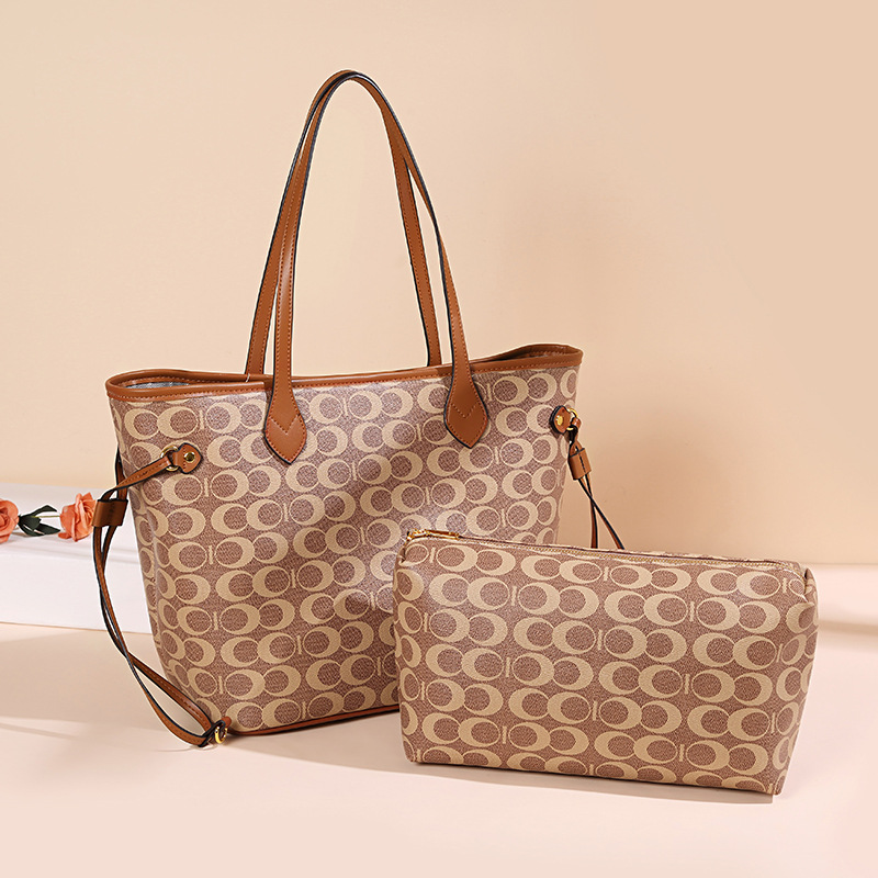 Hong Kong Kitty Pet Bag Universal Large Capacity Single Shoulder Primary and secondary bag Old flower special handbag Fashion handbag Female 9505