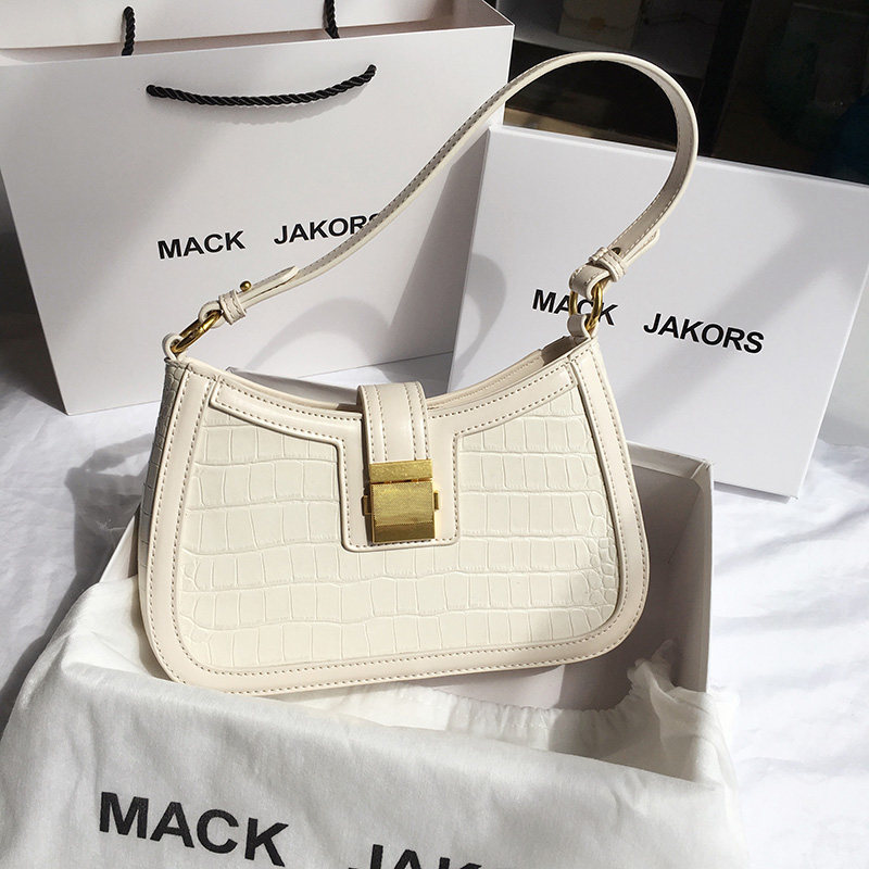 Hong Kong MackJakors genuine leather Fashion women's new fashion single shoulder axillary bag inclined satchel 100 hitch