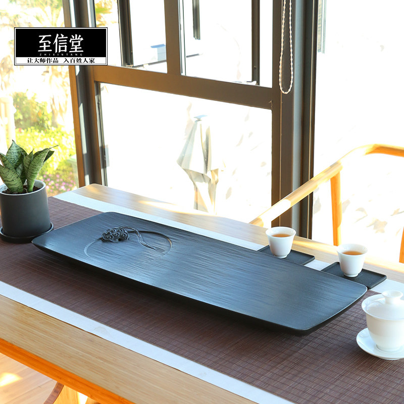 Zhixintang handmade whole piece of natural black gold stone tea plate Stone head tea table drainage household black gold stone tea sea simple