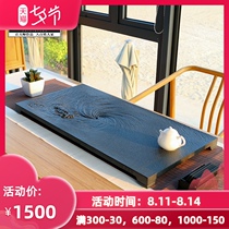 Zhixintang handmade whole piece of natural black gold stone tea tray Stone head raw stone tea table Living room stone tea tray Household tea set