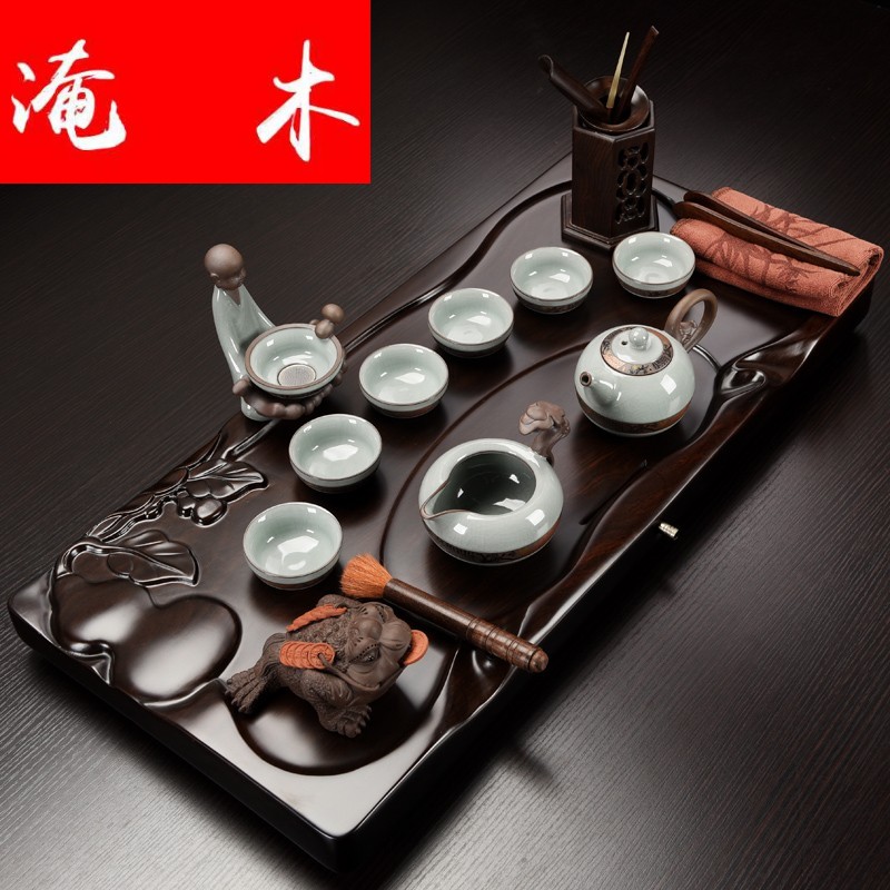 Submerged solid wood tea table of a complete set of household contracted ebony wood tea tray was contracted kung fu tea kettle ceramic tea set