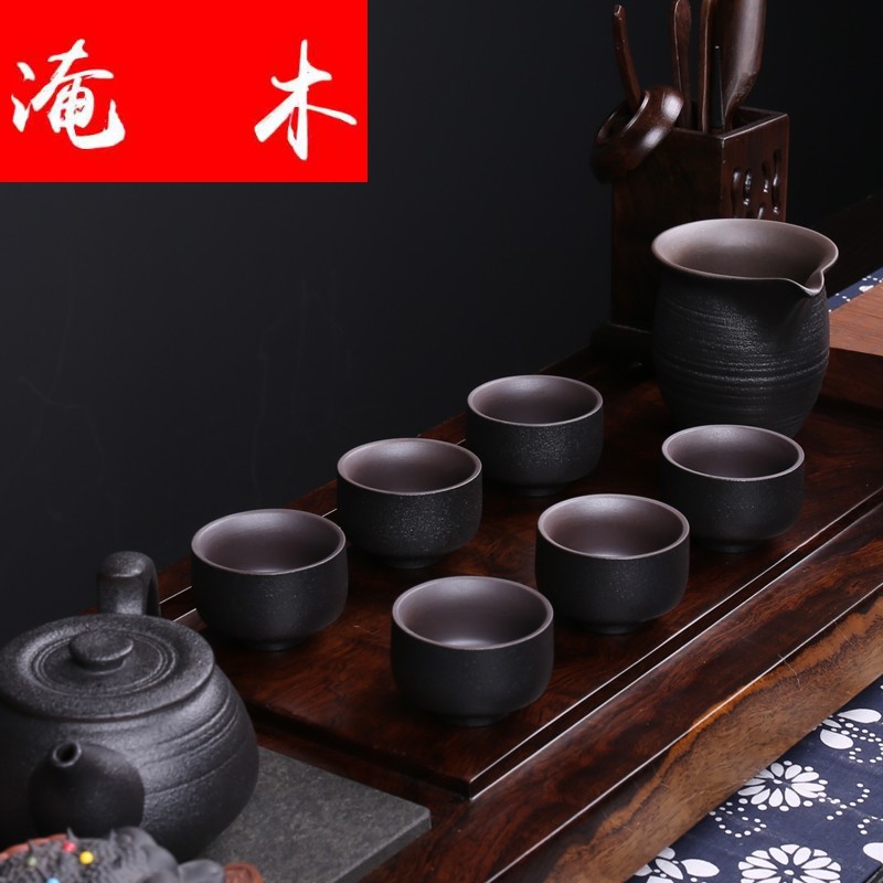 Flooded the whole piece of ebony wood tea tray ceramic kung fu tea set of black suit of a complete set of domestic tea the original solid wood