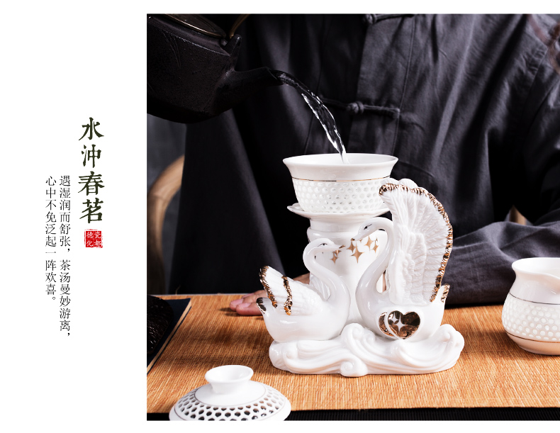 NiuRen exquisite hollow out half automatic ceramic kung fu tea set lazy household tureen tea to implement the hot
