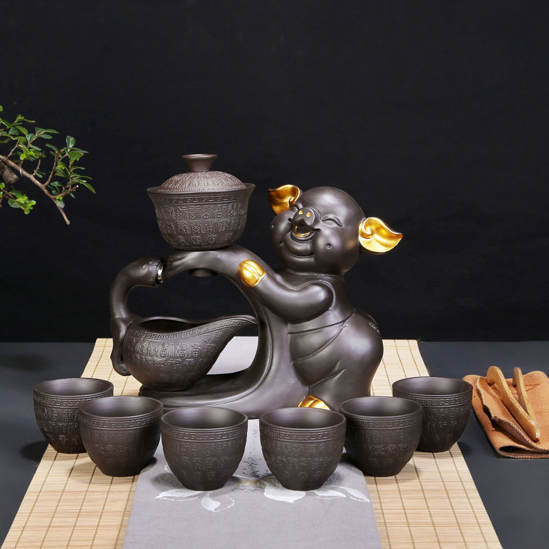 Stone ground tea purple sand tea set automatic tea sets ceramic lazy all semi - automatic zisha teapot tea