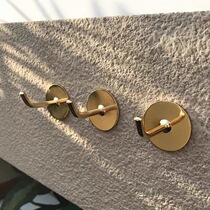 Golden strong hook without punch-free wall sticking to household bedroom door behind a single brass hook