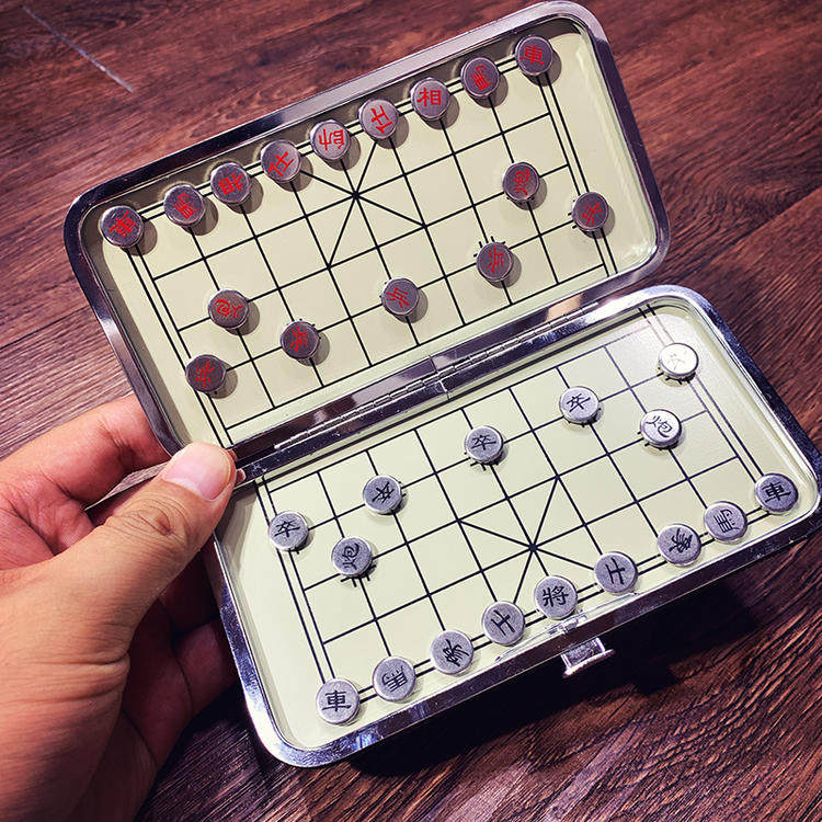 Miss Hammer recommends magnetic folding small chess compact and lightweight and kill a plate at any time