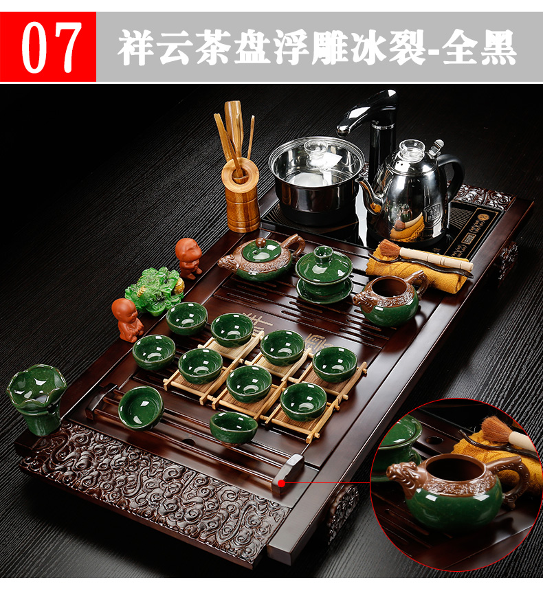 Back on solid wood tea tray was four unity of household ceramic kung fu tea set of a complete set of automatic tea set