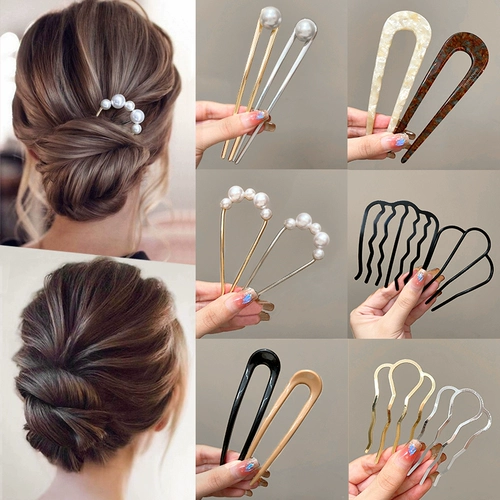 Голова маруко фиксирует артефакт самка u -в форме волос. Новая задняя головка