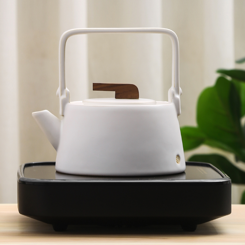 Japanese ceramic kettle white pottery emperor in the boiled tea, the electric TaoLu suit household kung fu tea tea pot of girder
