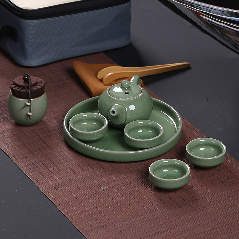 Hin reputation Japanese ceramics your up with a pot of four cups of portable is suing the car travel elder brother up with ceramic kung fu tea set