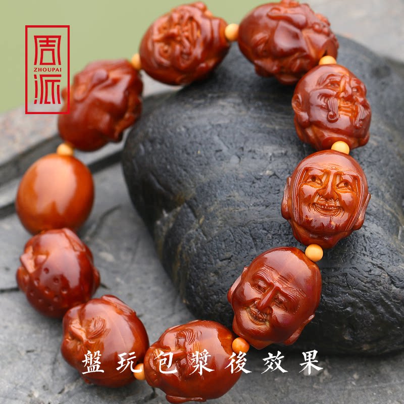 Zhou Pi Xing double-sided 18 Luohan olive nucleus string pure hand-carved iron core text play soda