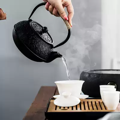 Mud handmade Japanese cast iron boiling water tea brewing Iron Pot Black Crystal furnace set in Southern Japan home