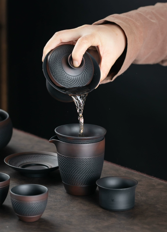 Tím gốm Kung Fu trà bộ retro hộ gia đình gốm đơn giản cát tím ấm trà bìa bát bộ hoàn chỉnh của chén trà hộp quà tặng bộ trà đạo hắc tử sa