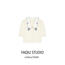 Embroidered lapel white shirt female design sense niche Korean bubble sleeve temperament spring coat tide