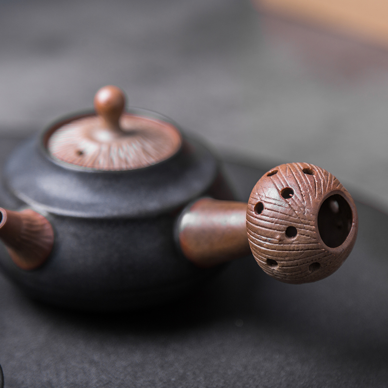 The content of creative side pot of checking ceramic teapot tea kungfu tea set travel bowl is a set of tea cups