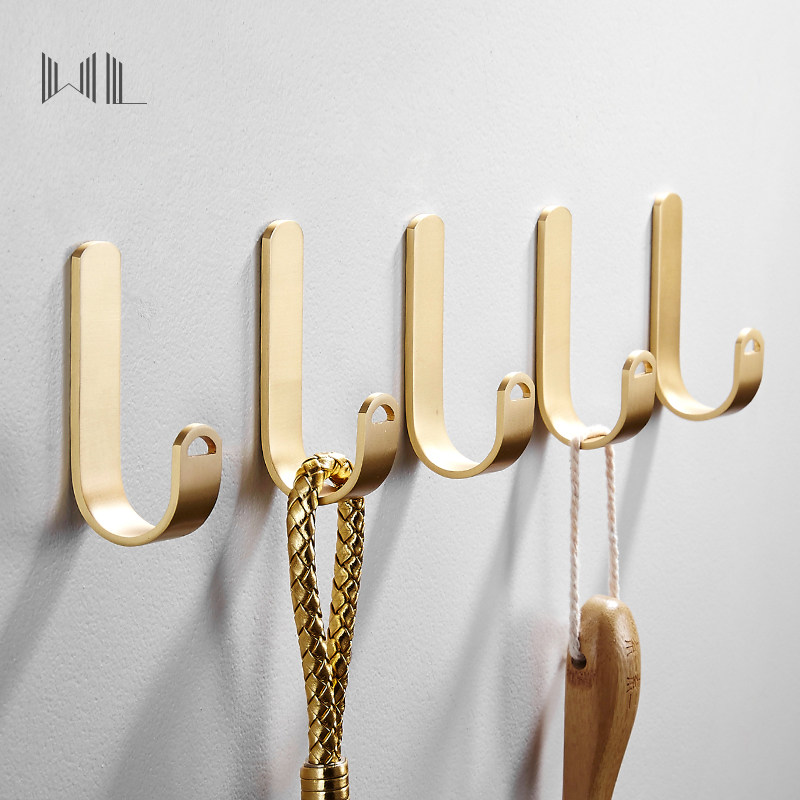 Nordic Brass small hook Entrance free hole coat hook Gold decoration Bedroom wall single hook Simple towel hook